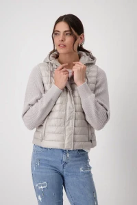 Quilted jacket with knitted sleeves