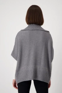 Knitted cape with honeycomb pattern