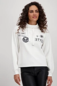 Sweatshirt with patches and rhinestones