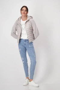 Quilted jacket with knitted sleeves