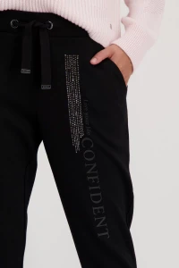 Jogging bottoms with rhinestones and script