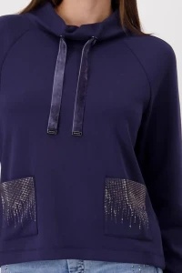 Sweatshirt with embellished pockets