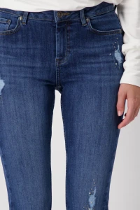 Destroyed jeans with rhinestones 