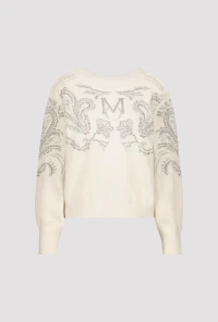 Reversible jumper with embellishment