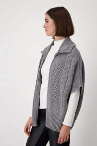 Knitted cape with honeycomb pattern