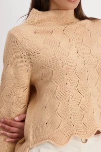 Jumper with cable stitch pattern