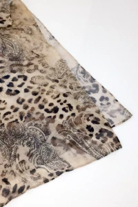 Light scarf with leopard paisley pattern